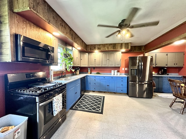 812 W Walnut Dr, Rockville, IN 47872 - kitchen with ceiling fan, a sink, light countertops, light floors, and stainless steel appliances