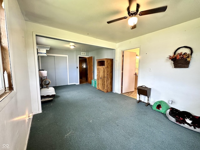 812 W Walnut Dr, Rockville, IN 47872 - bedroom featuring a closet, carpet flooring, baseboards, and ceiling fan