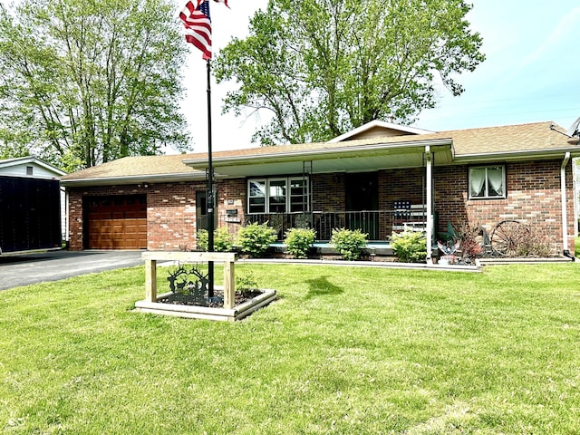 812 W Walnut Dr, Rockville, IN 47872 - single story home with a garage, a front yard, and brick siding