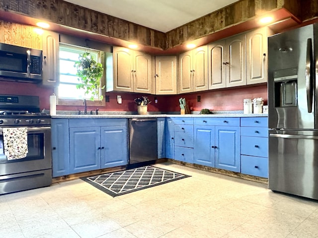 812 W Walnut Dr, Rockville, IN 47872 - kitchen with light countertops, appliances with stainless steel finishes, a sink, and light floors