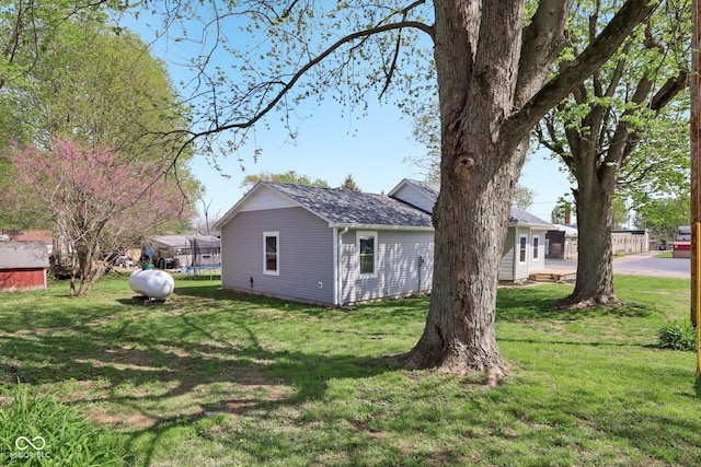 3098 Central, Arlington, IN 46104 - exterior space with a trampoline and a yard
