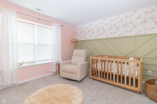 192 Lynnette Way, Cumberland, IN 46229 - bedroom featuring carpet flooring, a nursery area, baseboards, wallpapered walls, and visible vents