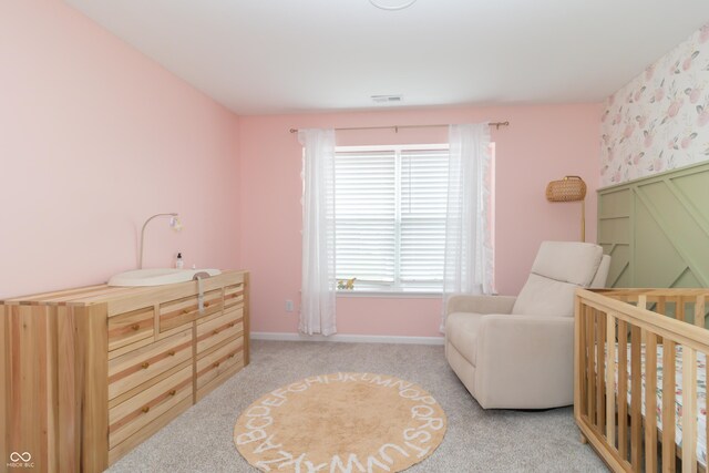 192 Lynnette Way, Cumberland, IN 46229 - carpeted bedroom with baseboards, visible vents, multiple windows, and a crib