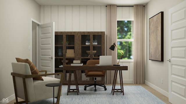 carpeted home office featuring baseboards