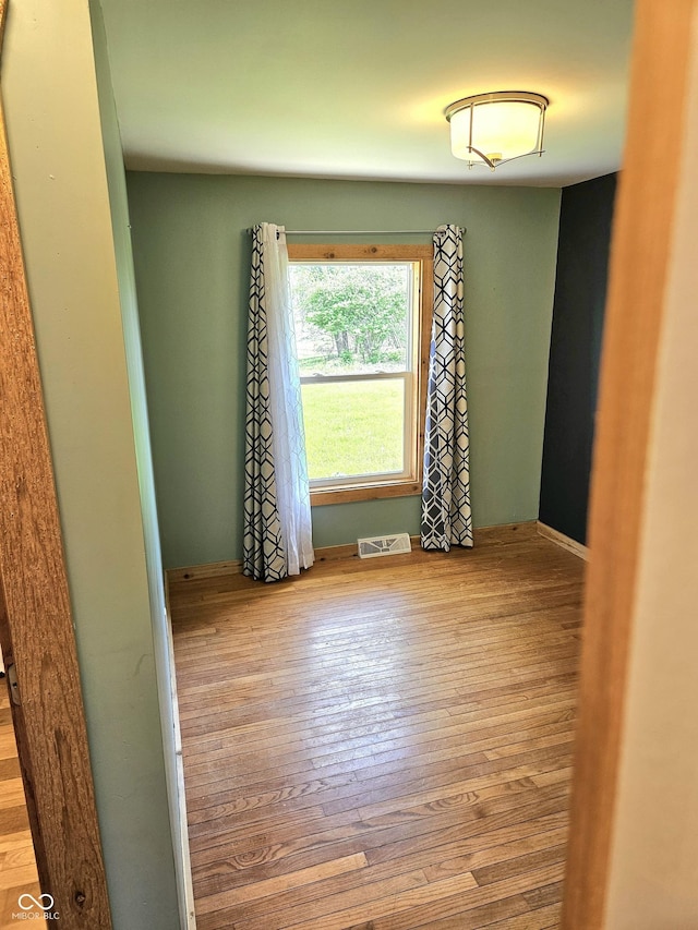 1647 State Ferry Rd, Solsberry, IN 47459 - empty room featuring wood finished floors and visible vents