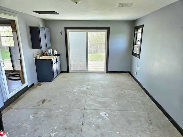 1647 State Ferry Rd, Solsberry, IN 47459 - unfurnished dining area with baseboards, concrete floors, and visible vents