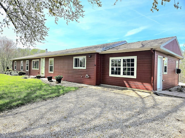 1647 State Ferry Rd, Solsberry, IN 47459 - rear view of house with a lawn