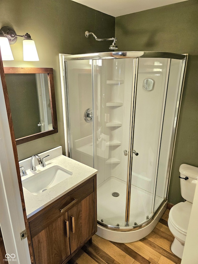 1647 State Ferry Rd, Solsberry, IN 47459 - full bath with toilet, a shower stall, wood finished floors, and vanity