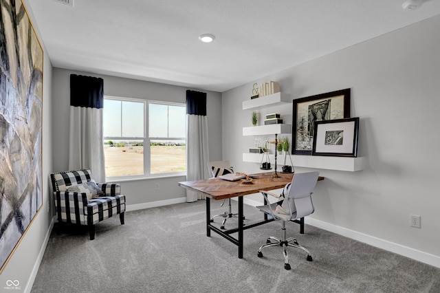 office featuring baseboards and carpet floors