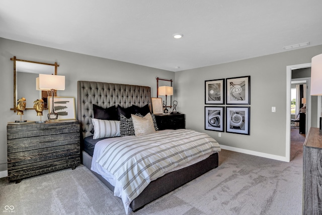 bedroom with carpet flooring, baseboards, and visible vents