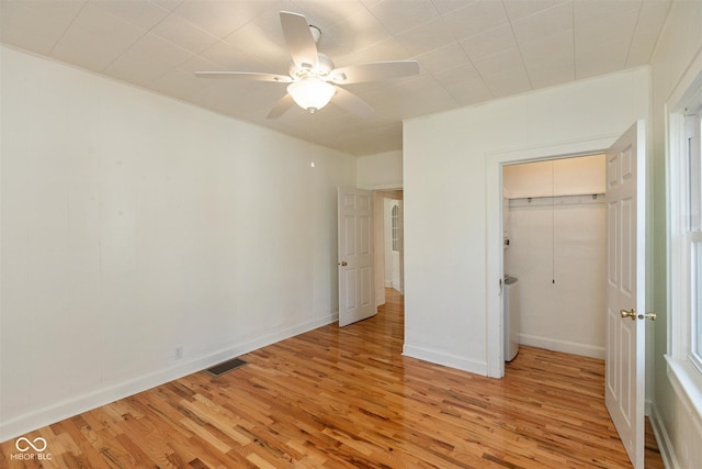 4710 Hinesley Ave, Indianapolis, IN 46208 - unfurnished bedroom featuring ceiling fan, visible vents, baseboards, a closet, and light wood-style floors