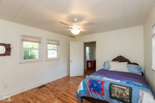 4710 Hinesley Ave, Indianapolis, IN 46208 - bedroom featuring visible vents, light wood finished floors, and multiple windows