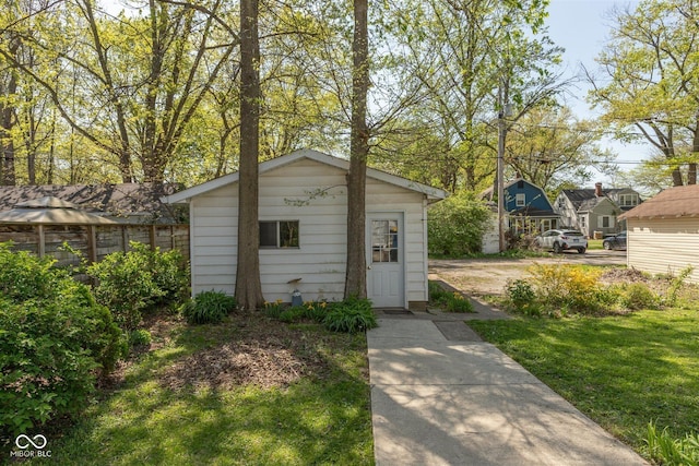 4710 Hinesley Ave, Indianapolis, IN 46208 - view of outdoor structure with fence and an outbuilding