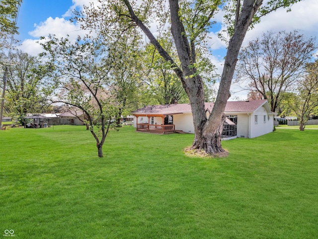 view of yard with a deck