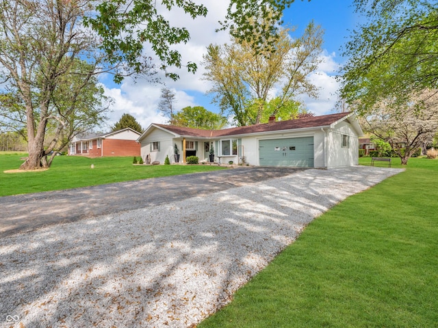 ranch-style house featuring driveway, a chimney, a front yard, and a garage