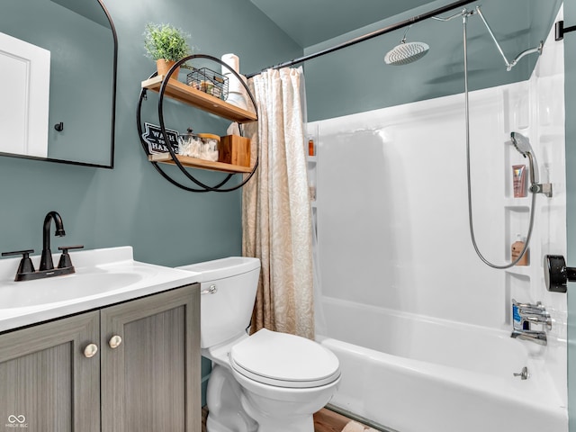 full bath with toilet, shower / bath combination with curtain, and vanity