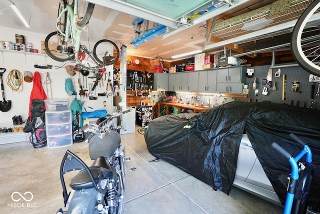 garage with a workshop area