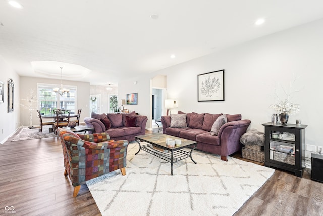 9359 Foudray Cir N, Avon, IN 46123 - living room with wood finished floors, a chandelier, recessed lighting, and baseboards