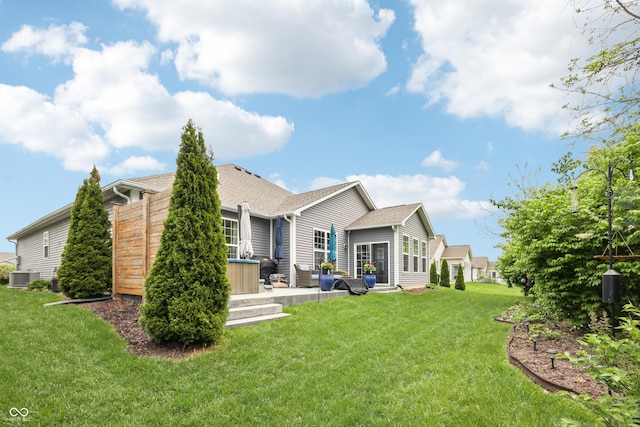 9359 Foudray Cir N, Avon, IN 46123 - back of house featuring cooling unit, a yard, and a patio