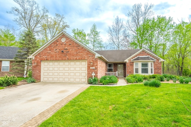 ranch-style home with an attached garage, concrete driveway, a front lawn, and brick siding