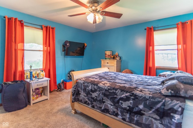 carpeted bedroom featuring a ceiling fan
