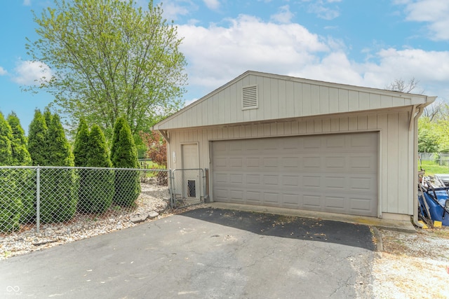 detached garage with fence