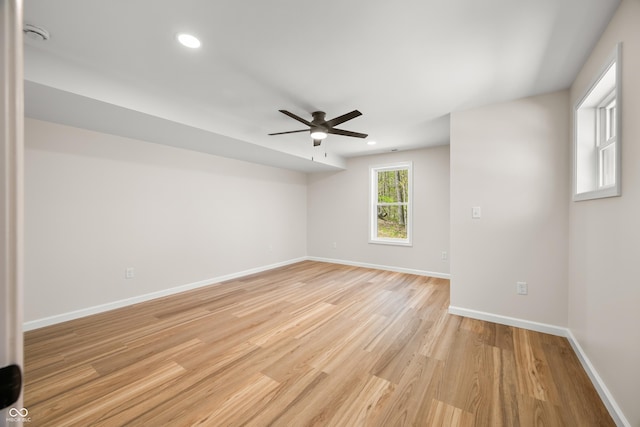 unfurnished room featuring baseboards, recessed lighting, ceiling fan, and light wood-style flooring