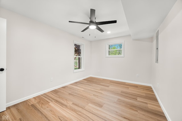 unfurnished room featuring a ceiling fan, baseboards, recessed lighting, and light wood finished floors