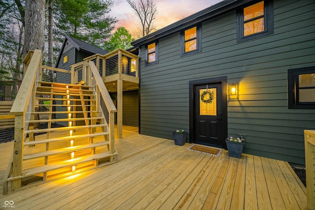 deck at dusk with stairs