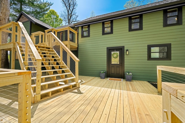 deck featuring stairway