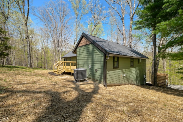 view of outbuilding featuring central AC