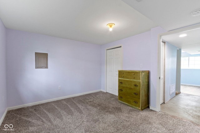 6638 Sunbury Dr, Indianapolis, IN 46241 - unfurnished bedroom featuring a closet, baseboards, carpet flooring, and visible vents