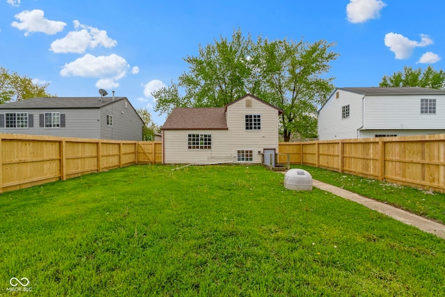 6638 Sunbury Dr, Indianapolis, IN 46241 - rear view of house featuring a lawn and a fenced backyard