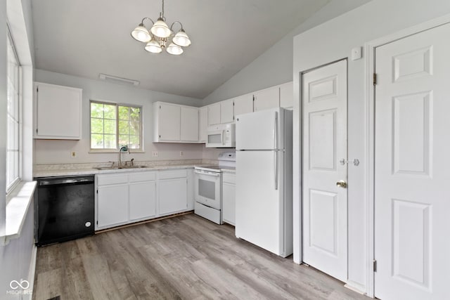 6638 Sunbury Dr, Indianapolis, IN 46241 - kitchen with a sink, vaulted ceiling, white appliances, and light countertops