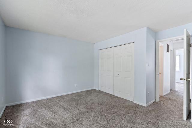 6638 Sunbury Dr, Indianapolis, IN 46241 - unfurnished bedroom with carpet flooring, baseboards, visible vents, and a closet