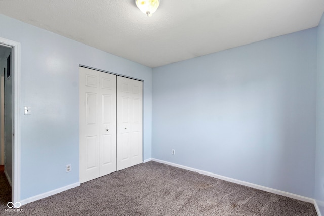 6638 Sunbury Dr, Indianapolis, IN 46241 - unfurnished bedroom featuring baseboards, carpet flooring, and a closet