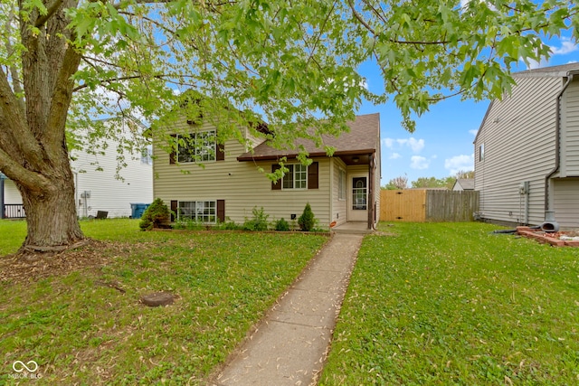 6638 Sunbury Dr, Indianapolis, IN 46241 - tri-level home with fence and a front yard