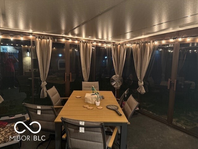 view of carpeted dining area