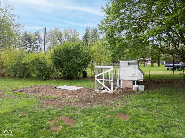 view of yard with exterior structure