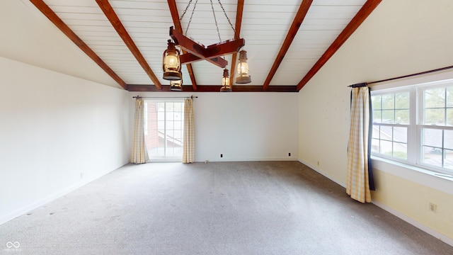 unfurnished room with wooden ceiling, baseboards, lofted ceiling with beams, and carpet flooring