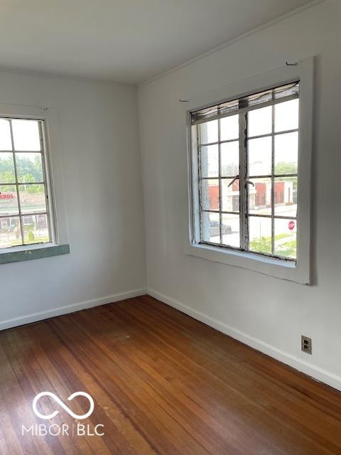 302 E Main St, Greenfield, IN 46140 - empty room featuring wood finished floors