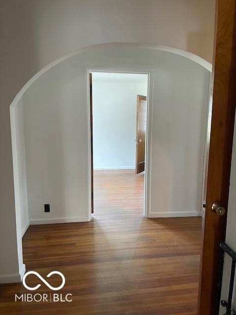 302 E Main St, Greenfield, IN 46140 - hallway featuring arched walkways and wood finished floors