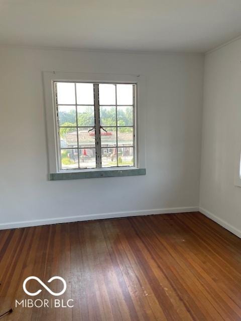302 E Main St, Greenfield, IN 46140 - unfurnished room with wood finished floors and baseboards