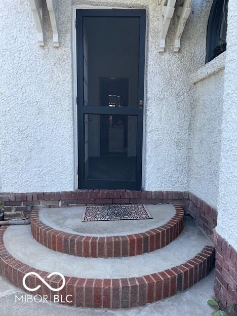 302 E Main St, Greenfield, IN 46140 - view of exterior entry featuring stucco siding