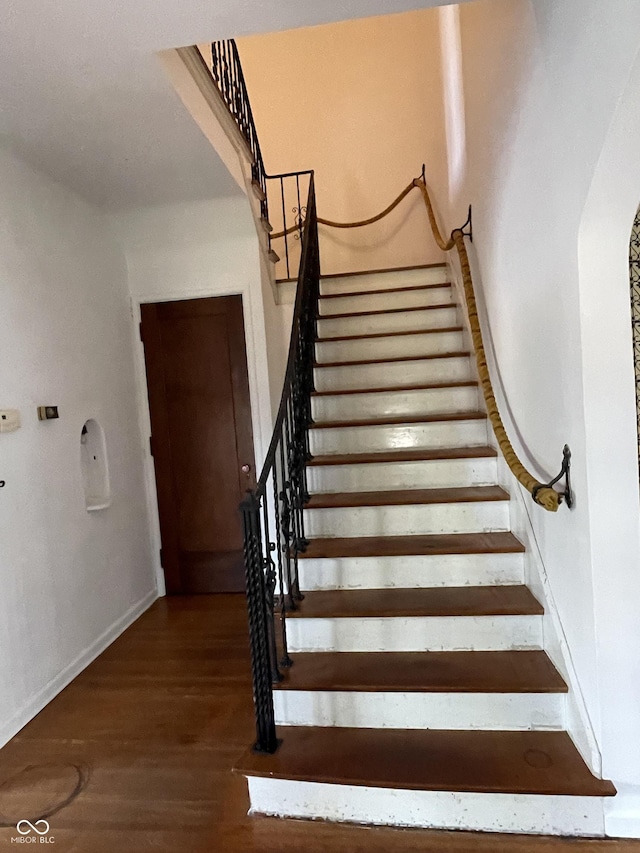 302 E Main St, Greenfield, IN 46140 - stairs with wood finished floors and arched walkways