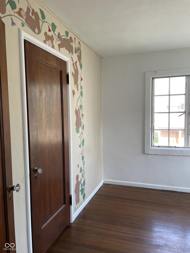 302 E Main St, Greenfield, IN 46140 - unfurnished room featuring dark wood-type flooring