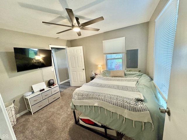 carpeted bedroom with baseboards and a ceiling fan