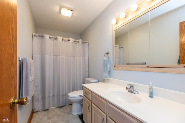 full bathroom featuring vanity, tile patterned flooring, toilet, and a shower with shower curtain