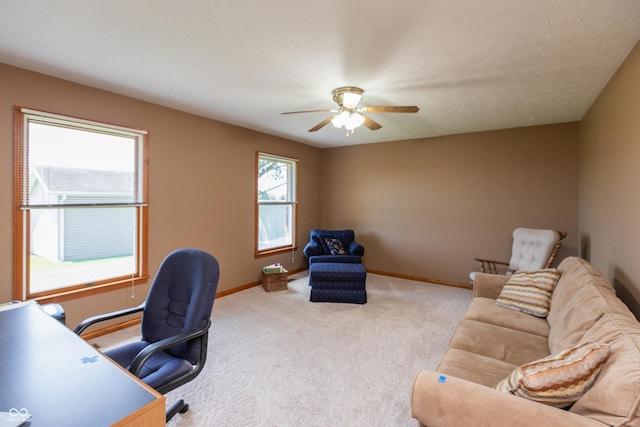 office with baseboards, ceiling fan, and carpet