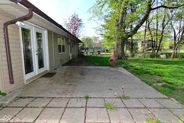 view of patio featuring fence